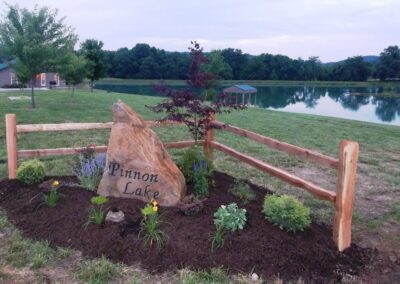Pinnon Lake Cabins Welcome Sign Rock
